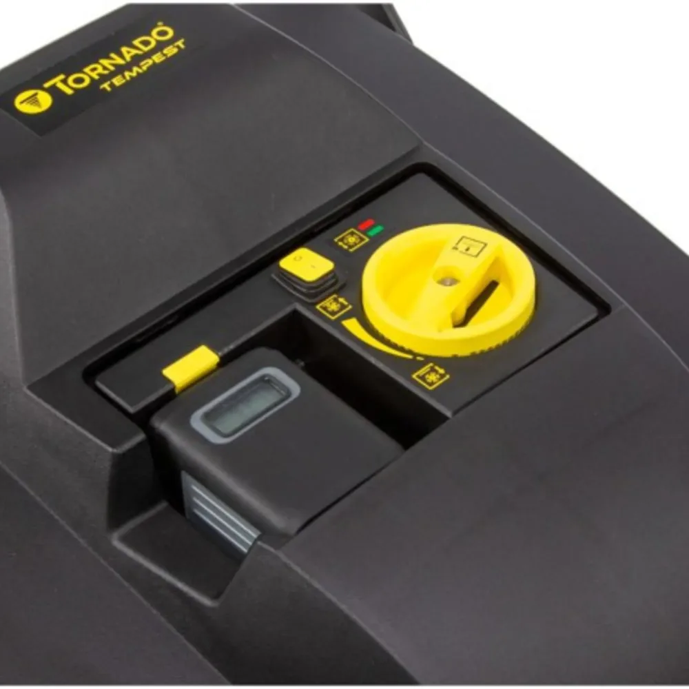 Tornado Tempest cordless carpet sweeper vac in use on commercial carpet