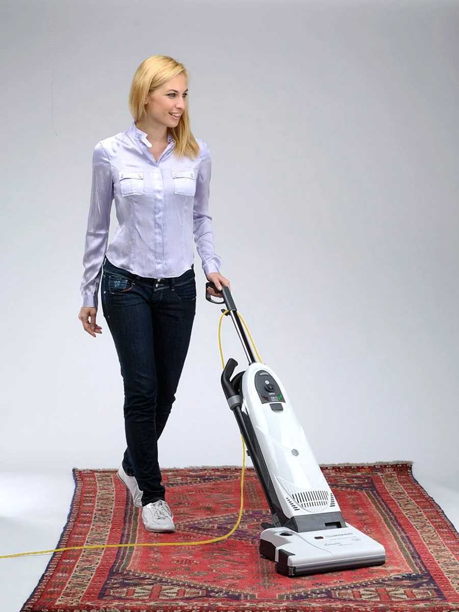 Lindhaus Diamante commercial upright vacuum cleaning carpet in use