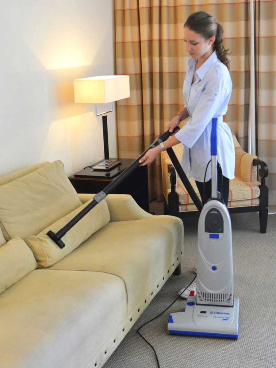 Lindhaus Dynamic eco FORCE commercial upright vacuum cleaning upholstery in use