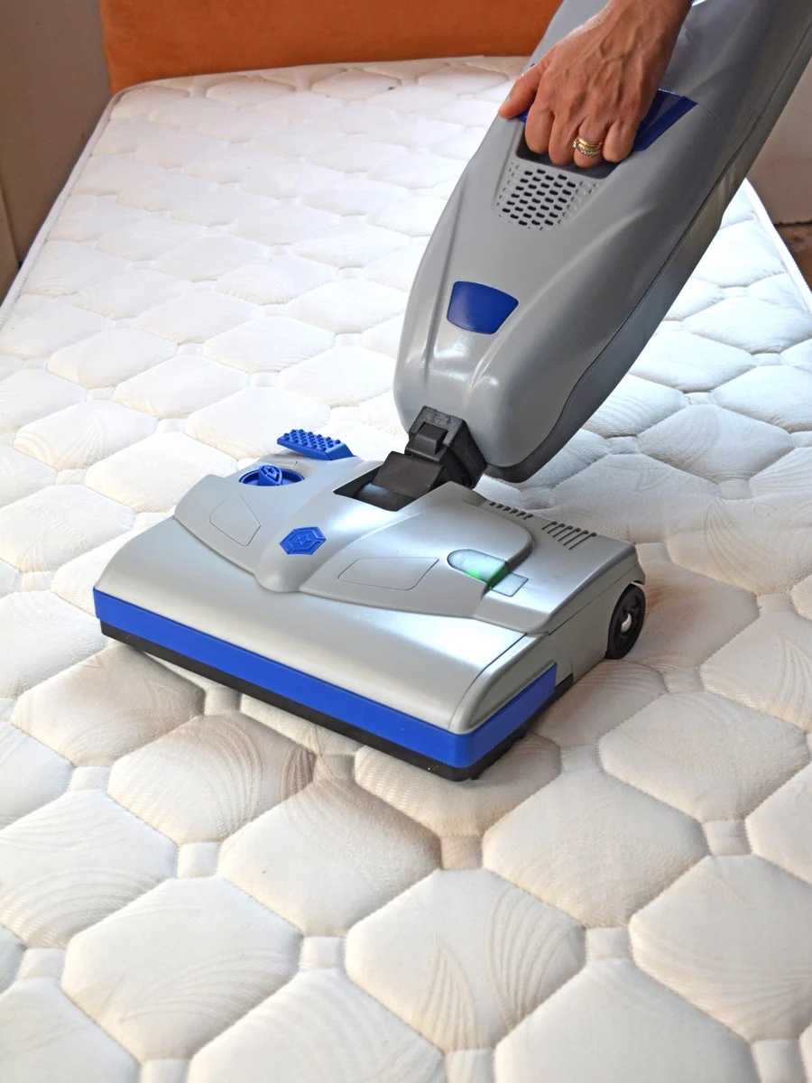 Lindhaus LB3 vacuum cleaning a mattress with power nozzle