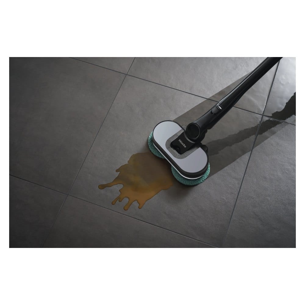 Miele Triflex HX3 AquaTwister mopping Miele Triflex HX3 AquaTwister mopping a spill on a tile floor